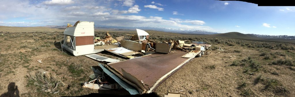 An entire mobile home left for somebody else to pick up..one person's junk on everybody's land.